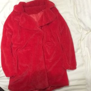 Red faux fur coat